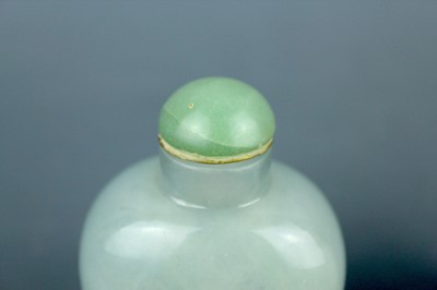 Lot 2016 - Two Chinese jade snuff bottles, Qing Dynasty,...