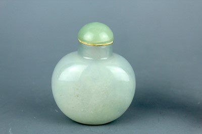 Lot 2016 - Two Chinese jade snuff bottles, Qing Dynasty,...