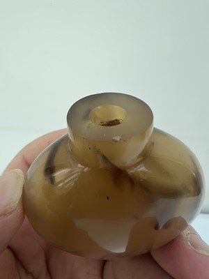 Lot 2017 - Two Chinese agate snuff bottles, 19th or 20th...
