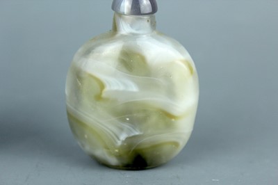 Lot 2017 - Two Chinese agate snuff bottles, 19th or 20th...