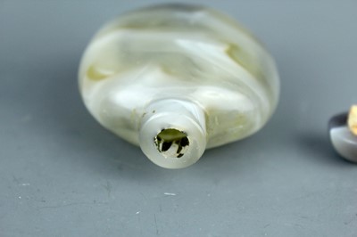 Lot 2017 - Two Chinese agate snuff bottles, 19th or 20th...