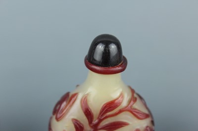 Lot 2019 - A set of three Chinese red overlay white glass...