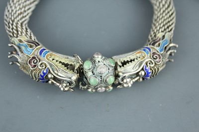 Lot 2059 - A Chinese white metal filigree ‘dragon’...