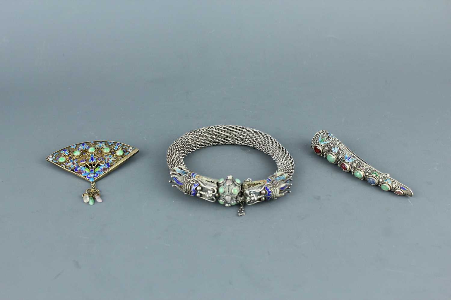 Lot 2059 - A Chinese white metal filigree ‘dragon’...