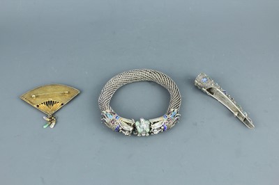 Lot 2059 - A Chinese white metal filigree ‘dragon’...