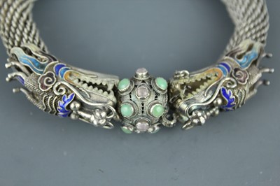 Lot 2059 - A Chinese white metal filigree ‘dragon’...