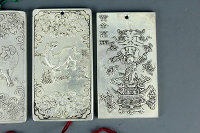 Lot 2058 - Seven Chinese white metal zodiac plaques...
