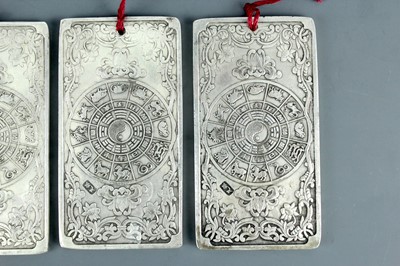 Lot 2058 - Seven Chinese white metal zodiac plaques...