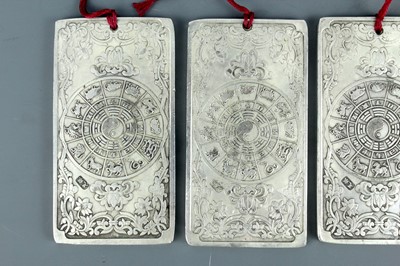 Lot 2058 - Seven Chinese white metal zodiac plaques...