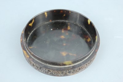 Lot 2073 - A Chinese tortoiseshell carved ‘Eight...