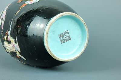 Lot 2080 - A Chinese black ground moulded ‘Eight...