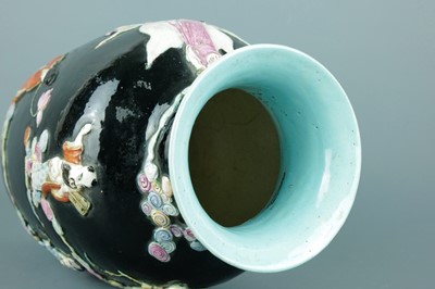 Lot 2080 - A Chinese black ground moulded ‘Eight...