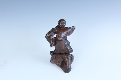 Lot 2093 - A set of three Chinese wood carved immortal...