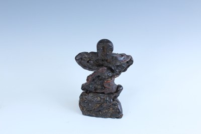 Lot 2093 - A set of three Chinese wood carved immortal...