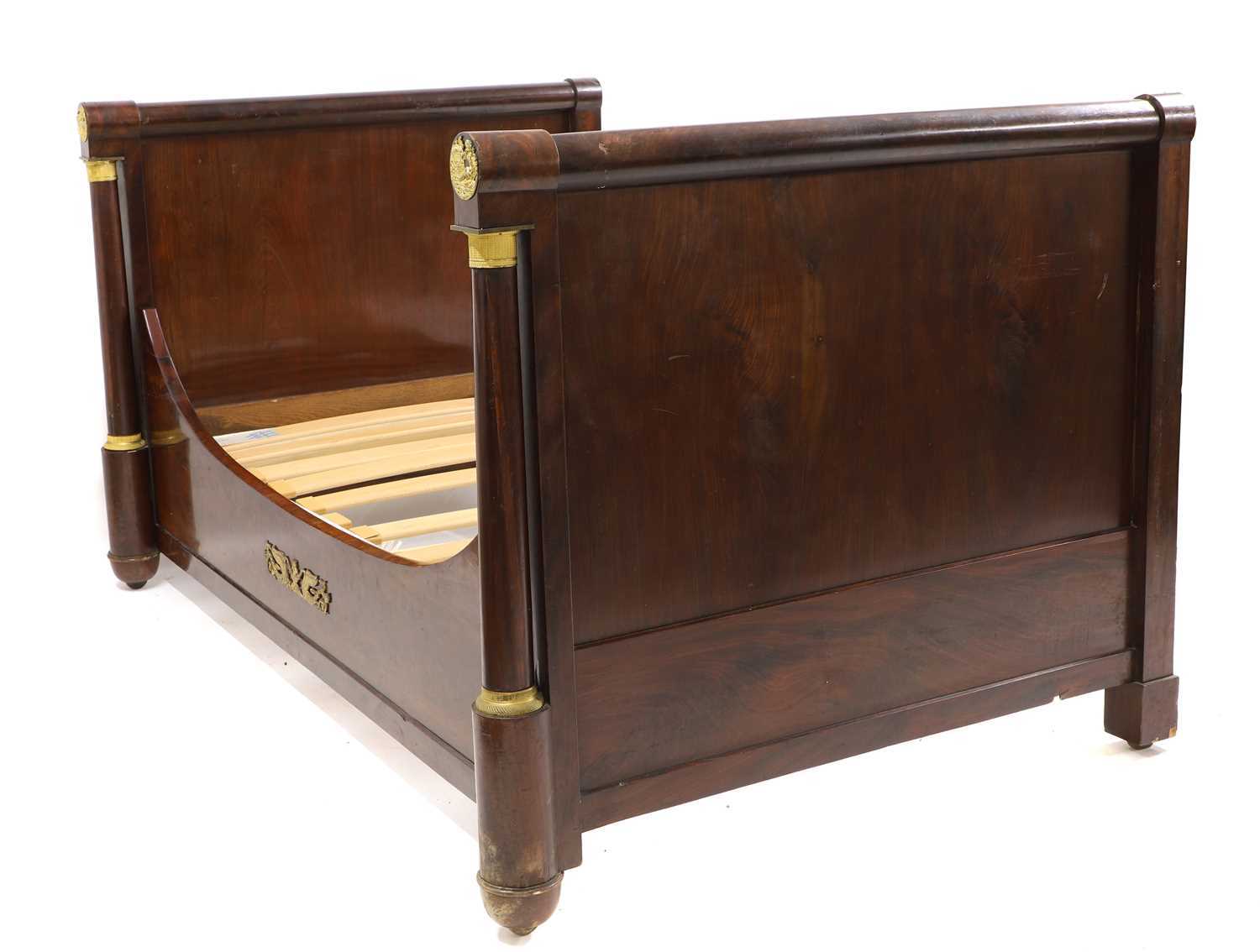 Lot 1114 - A 19th century French empire mahogany, flame...