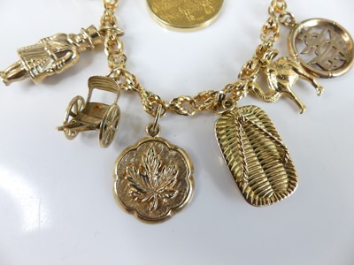 Lot 2582 - A yellow metal ropetwist link bracelet with...