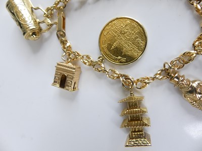 Lot 2582 - A yellow metal ropetwist link bracelet with...
