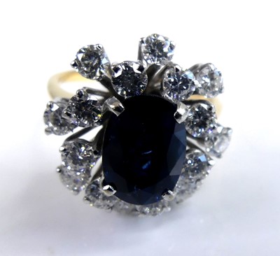 Lot 2640 - A yellow and white metal, sapphire and diamond...