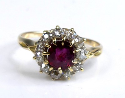 Lot 2641 - A yellow and white metal, ruby and diamond...