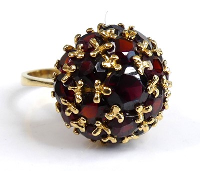 Lot 2658 - A yellow metal garnet bombe cluster ring...