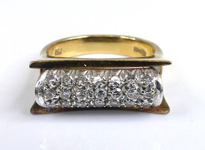 Lot 2659 - A yellow and white metal diamond dress ring...