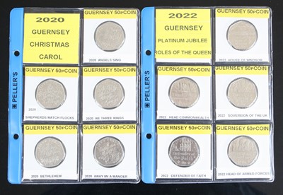Lot 2483 - Guernsey, an album of 50p coins many...