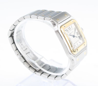 Lot 2604 - A Cartier Santos bi-metal mid-size wristwatch,...