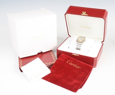 Lot 2604 - A Cartier Santos bi-metal mid-size wristwatch,...