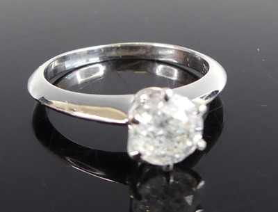 Lot 2605 - A white metal and diamond solitaire ring,...