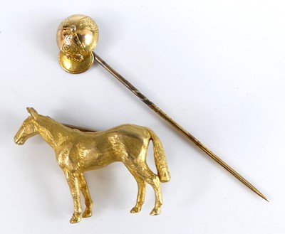 Lot 2678 - A 9ct yellow gold standing horse brooch, with...