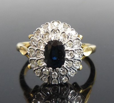 Lot 2680 - A yellow and white metal, sapphire and diamond...