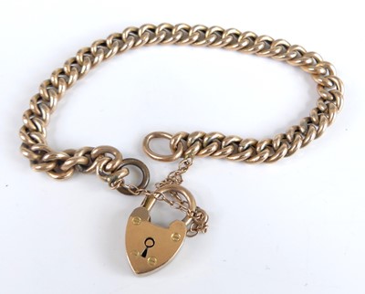 Lot 2686 - A 9ct rose gold rounded curblink bracelet,...