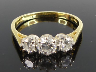 Lot 2692 - An 18ct yellow and white gold diamond...
