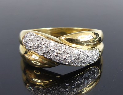 Lot 2703 - An 18ct yellow and white gold diamond...