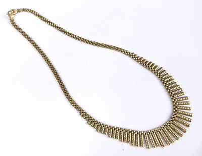 Lot 2721 - A 9ct yellow gold textured fringe necklet,...