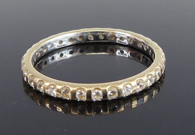 Lot 2723 - An 18ct yellow and white gold diamond full...