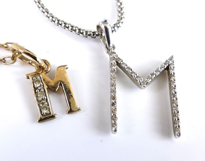 Lot 2724 - Two 9ct gold initial M pendants and chains,...
