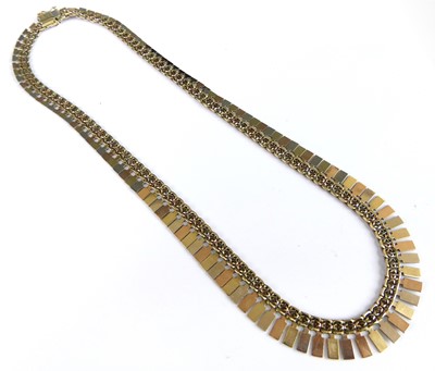 Lot 2734 - A modern 9ct three-colour gold textured link...