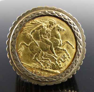 Lot 2737 - A 9ct gold sovereign ring, set with a George V...