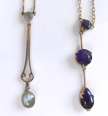 Lot 2746 - An Edwardian 9ct gold peridot set pendant on...