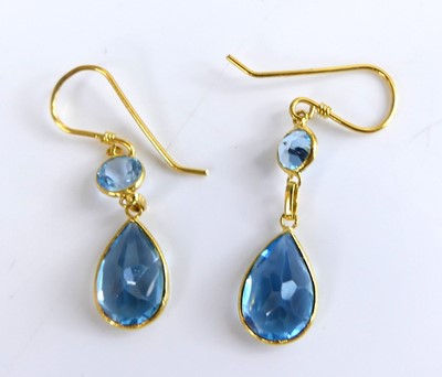 Lot 2749 - A pair of contemporary yellow metal blue topaz...