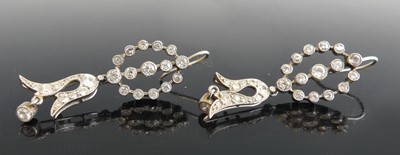 Lot 2804 - A pair of white metal diamond articulated drop...