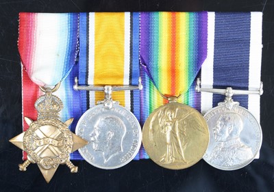 Lot 3403 - A WW I Naval group of four medals to include...