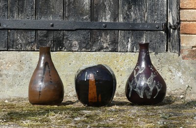Lot 126 - Two similar glazed pottery studio bottle vases,...