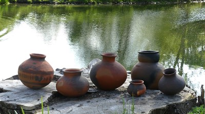 Lot 168 - A collection of six variously sized terracotta...