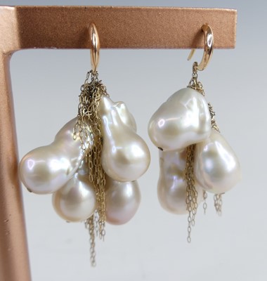 Lot 2823 - A pair of yellow metal pearl drop earrings,...
