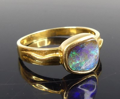 Lot 2828 - A yellow metal opal doublet dress ring,...