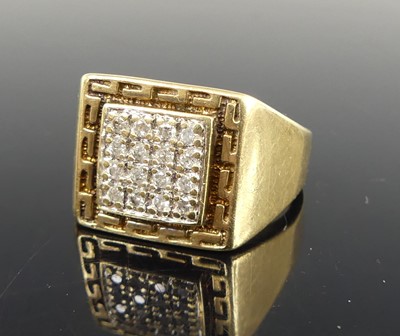 Lot 2833 - A 9ct yellow gold diamond set square signet...