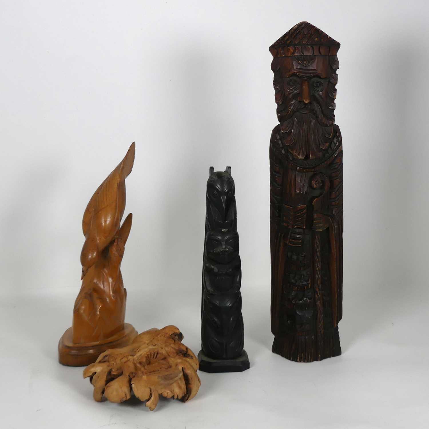 Lot 479 - A carved softwood figure of a bishop, modelled...