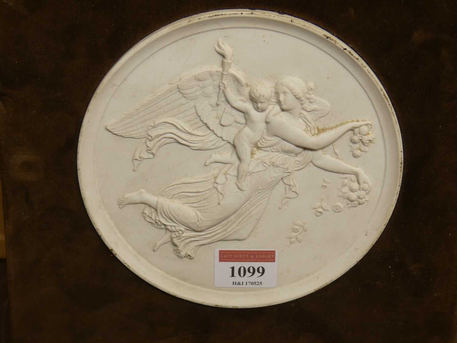 Lot 1099 - A parian porcelain relief plaque, dia.15cm, on...